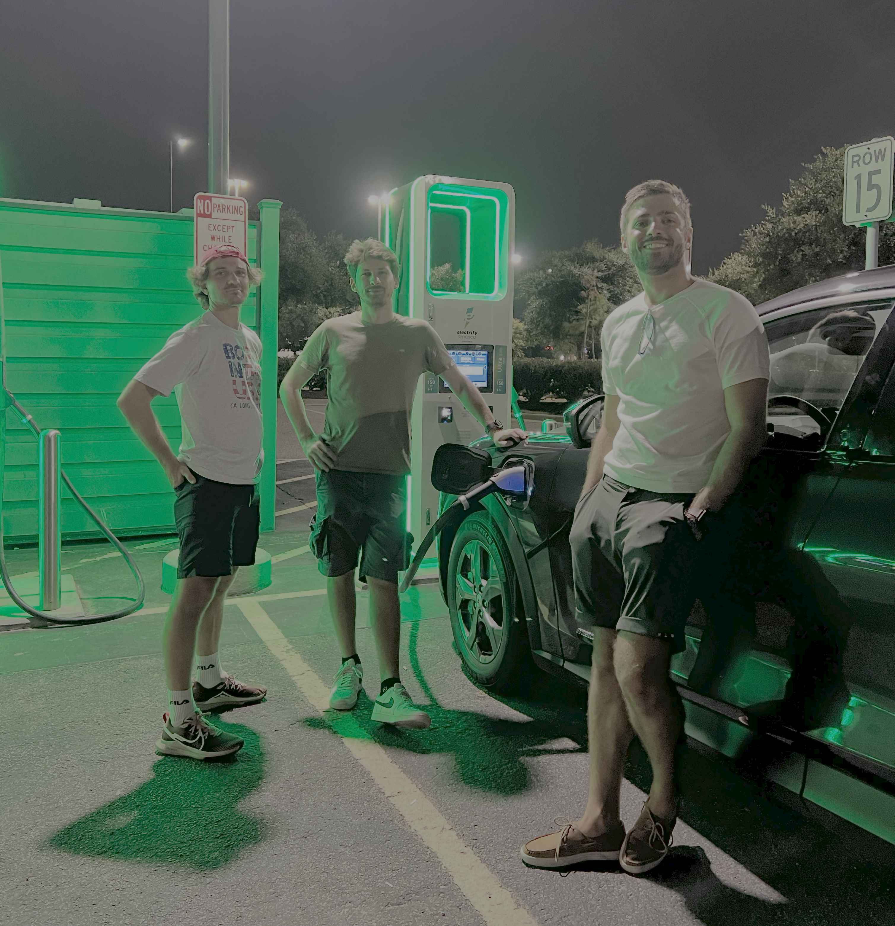 Voltaage team at EV charging station